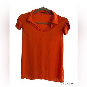 Tahiri orange blouse